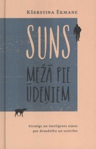 Suns mežā pie ūdeņiem