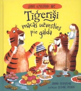 Tīģerīši mācās uzvesties pie galda