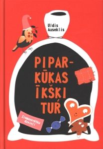 Piparkūkas īkšķi tur