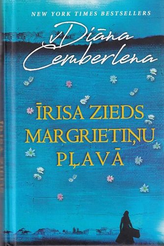 Īrisa zieds margrietiņu pļavā