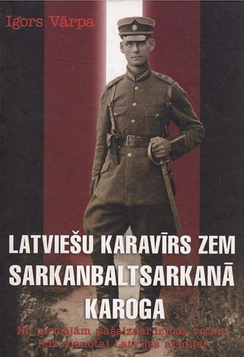 Latviešu karavīrs zem sarkanbaltsarkanā karoga